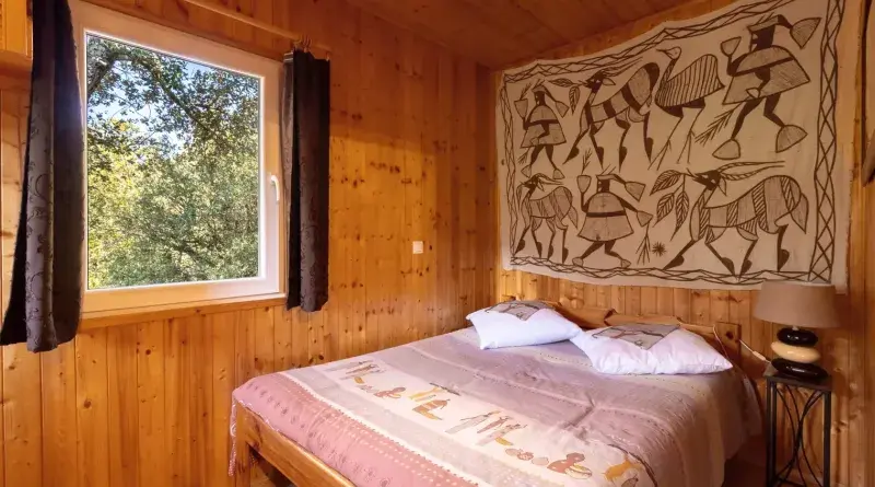 Chambre lit double chalet Afrique